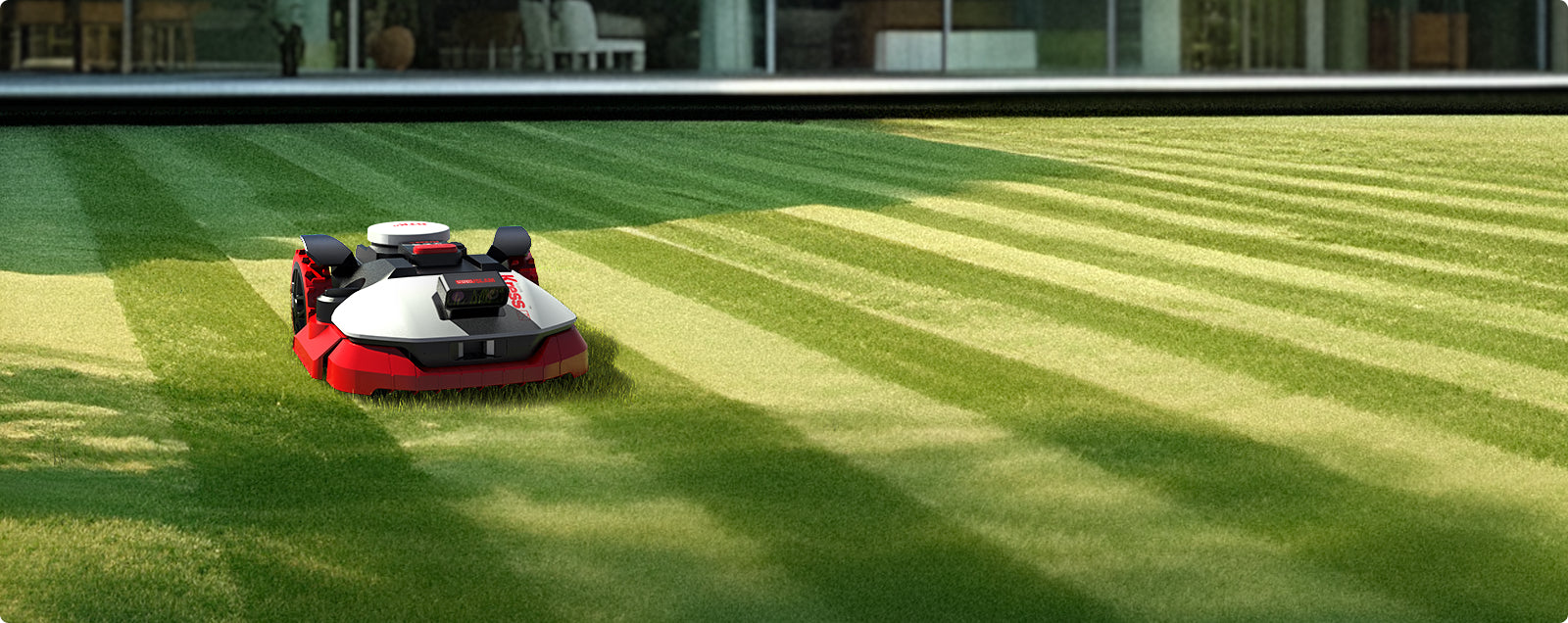 Kress EyePilot robotic mower creating professional lawn stripes in front of a modern home