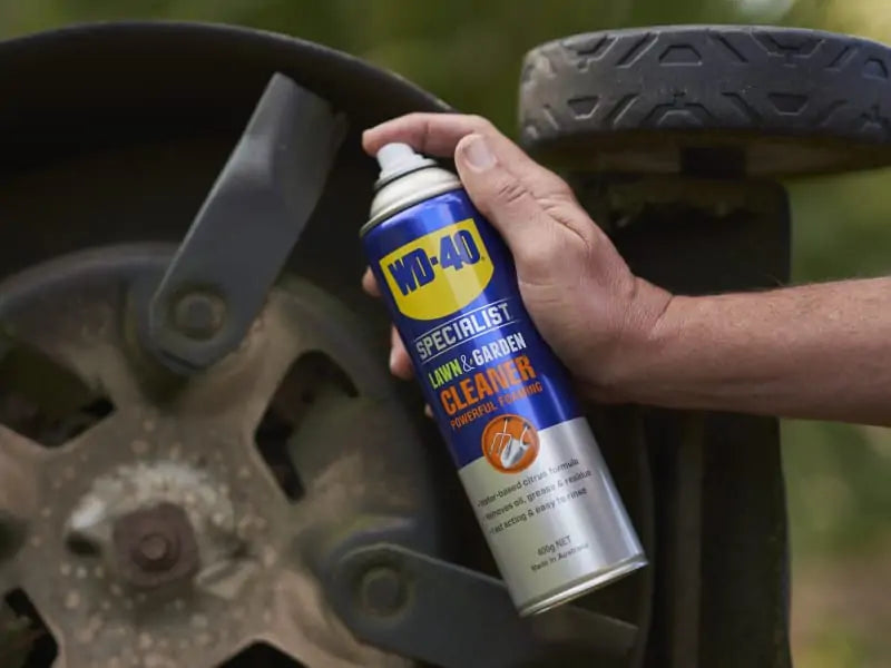 WD-40 Specialist Lawn & Garden Foaming Cleaner in use cleaning gardening tools